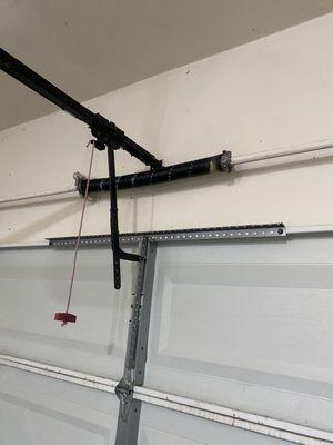 The new spring installed and functional.