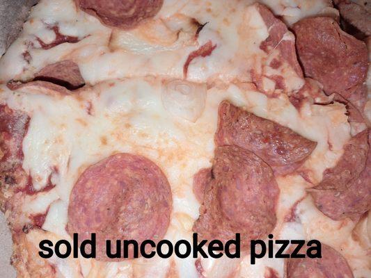 UNCOOKED PIZZA SOLD AFTER 1 HOUR WAIT