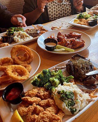 Double Crunch Bone-in Wings 8 oz. Top Sirloin* Side Crunchy Onion Rings