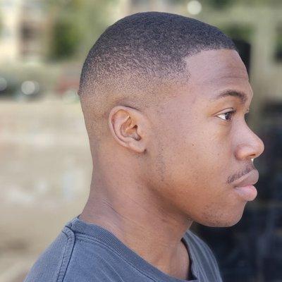 Mid blurry skin fade. Mustache line up. Crispy razor line up on front edge