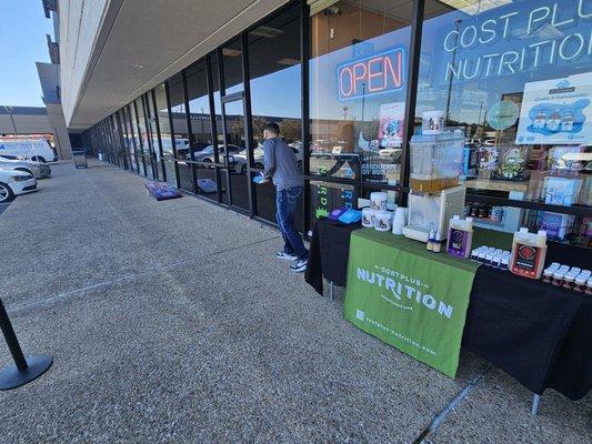 Competing for a gift certificate on Liquid Deaths cornhole boards. Free samples of an awesome multi