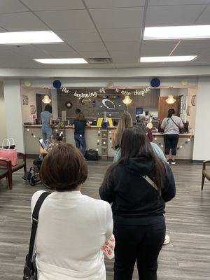 Long line to wait to check in on a Tuesday late morning.