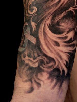 Detail of the blue cancer awareness ribbon.