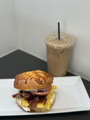The breakfast Asiago bagel with crisp bacon, egg, tomato, cheese, cream cheese and a yummy iced salted carmel coffee!