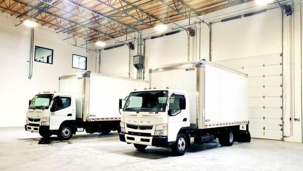 Two new trucks in our brand new shop