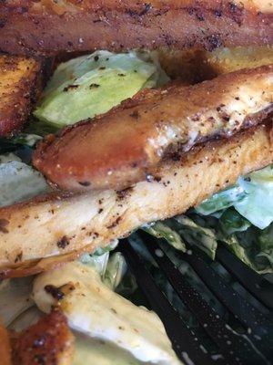 Another photo showing the goddamn disgusting petrified chicken. Don't eat here!!