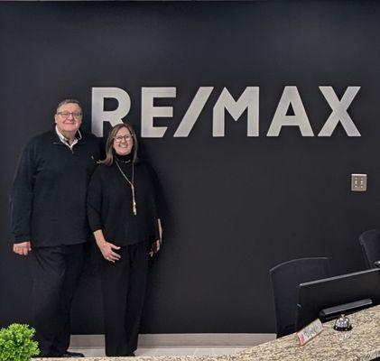 Cindy and Marty Eich, RE/MAX Suburban (office interior)