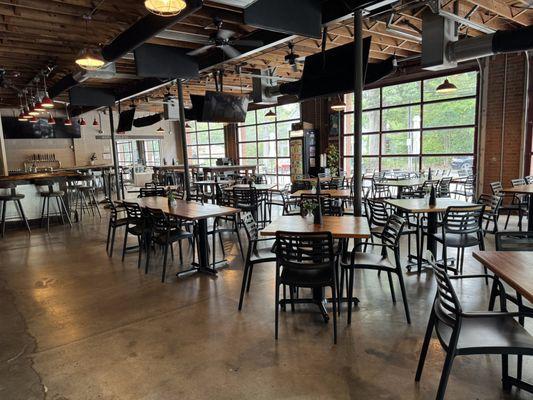 Middle James Brewing Waxhaw taproom. We are in a former fire station and have many garage doors and lots of natural light.