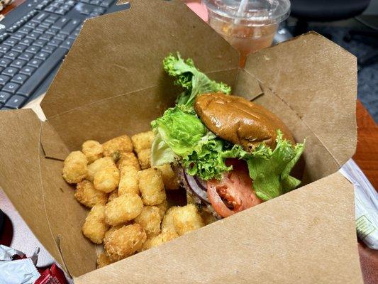 Green Chile double cheeseburger with tots.