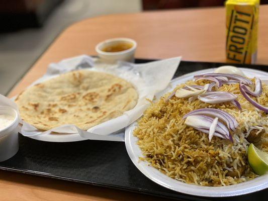 Chicken Biryani w/Naan and mango Frooti drink.