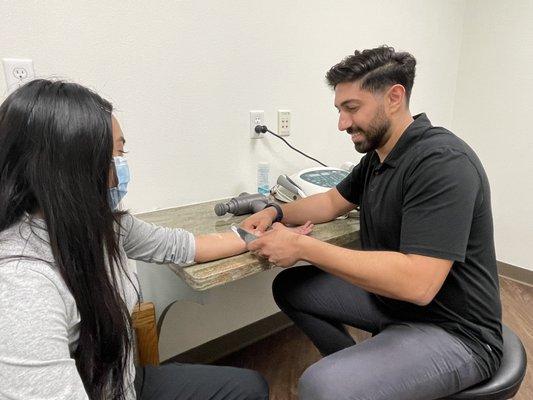 Graston technique / scraping. Helps with tendinitis, pain and swelling.