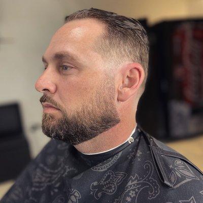 Slick back W/ low taper & beard work!