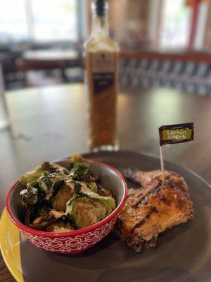 Lemon herb chicken with a side of fried Brussels sprouts