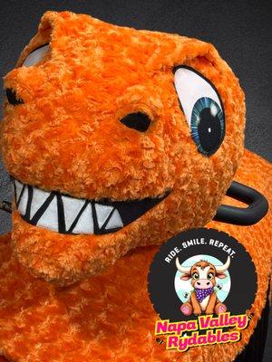 Take a stroll on this tough t-rex, he's out hunting for Wino the Rhino!