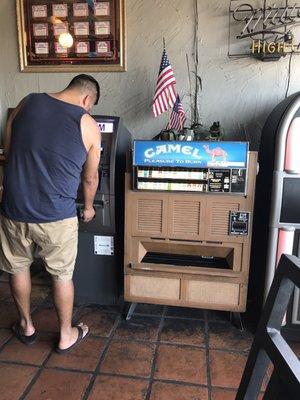 They have a cigarette machine. Definitely sets the tone/experience.