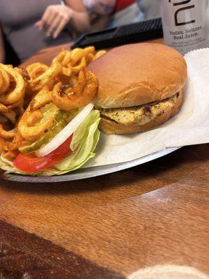 Grilled chicken sandwich with Cajun fries