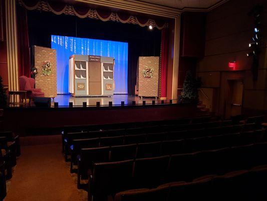 Interior house, with stage set for Christmas Carol