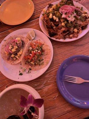 Pork carnitas and chicken tacos. Korean BBQ nachos