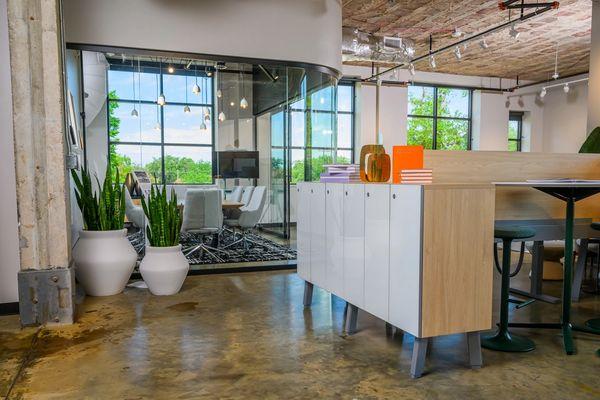 Sleek conference room with contract furniture + custom storage. Designed for productivity, collaboration, and professional impact.