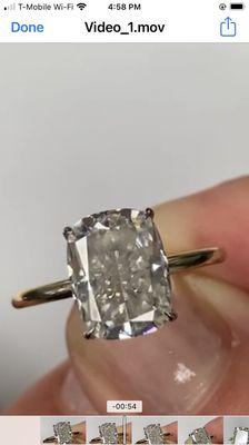 Reputable jewelers cut so that the BIG part of the stone is crisp and clear, yet here it is seen cloudy/blurry