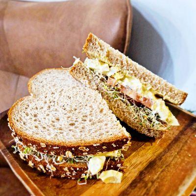 Egg Salad Sandwich on Honey Wheat, alfalfa sprouts instead of spring greens