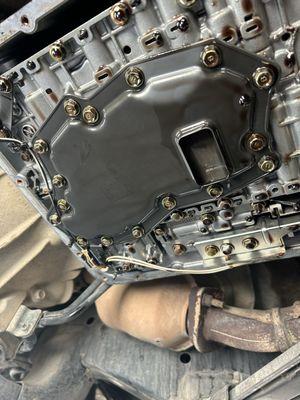 Replacing the transmission oil filter and also changing the transmission fluid