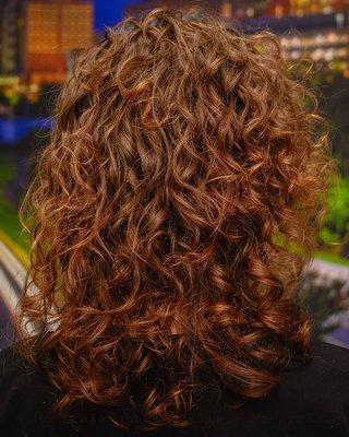 Personalized curly cut using cubist and devacut techniques.