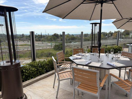 The patio overlooking the area, with the freeway immediately below.