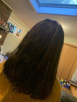 Tinsel added to hair.