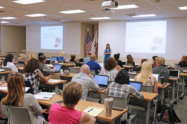 Katie Wagner, CEO & President, at a speaking engagement