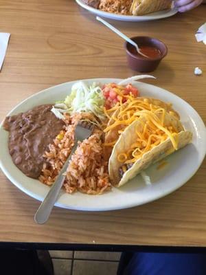 3 crispy beef tacos with rice& beans