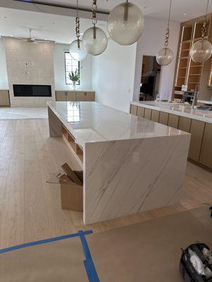Kitchen waterfall marble island