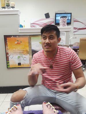 Nya did an amazing job on my feet, he took excellent care and detail with my pedicure. He put a cute sunset palm trees on my toes.