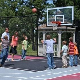 Jim Dob Duggar and his family play on their new outdoor basketball court and basketball system (Pro Dunk Diamond)