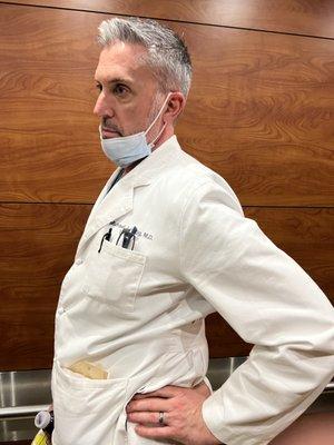 Dr Hagg wearing his mask around his chin