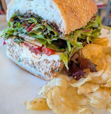 Half of the cranberry chicken salad sandwich special. I added the chips.