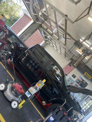 Getting a tire rotation done at the same time as an oil change. My car was finished just 5 minutes after this photo!