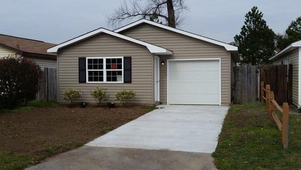 Stripped down to framing and completely remodeled in and out, including driveway and landscaping