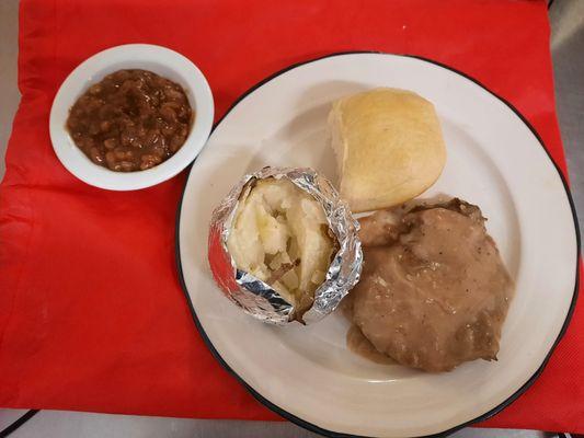 Baked steak and 2 sides