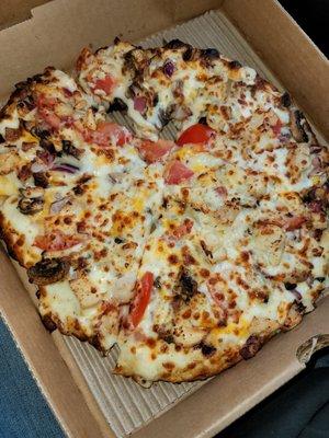 Supreme chicken, fresh cut tomatoes, plenty of chicken, not greasy.