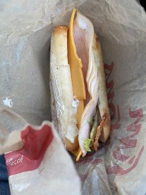 Turkey Club. Looks like a prison sandwich but did not taste too bad