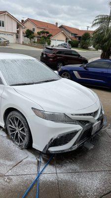 Exterior foam on Toyota Camry.