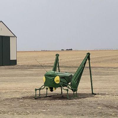 Caterpillar made of old tractor parts. About 2 miles north of Goodland, KS on route 27. Part of the Land and Sky scenic byway.