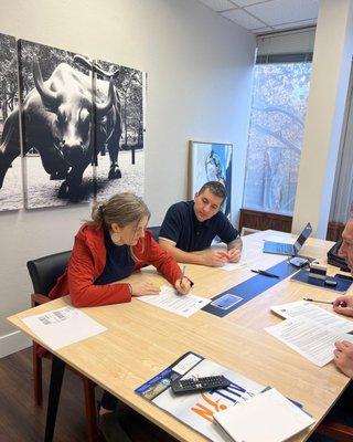 Office Signing - Started with a small single family house in Oakland and now 2-3 LLC's later and a third investment property in Alabama.