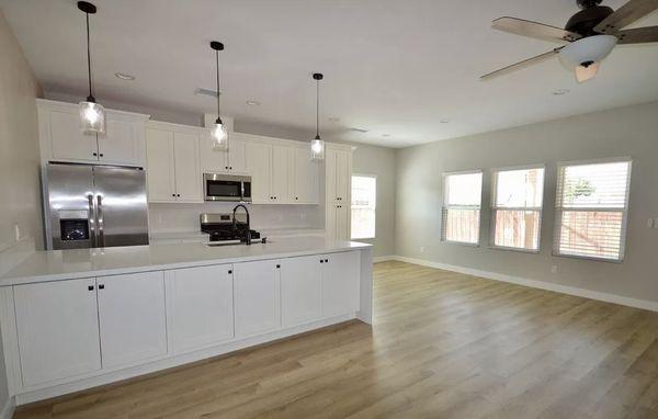 Kitchen with dining and living room.