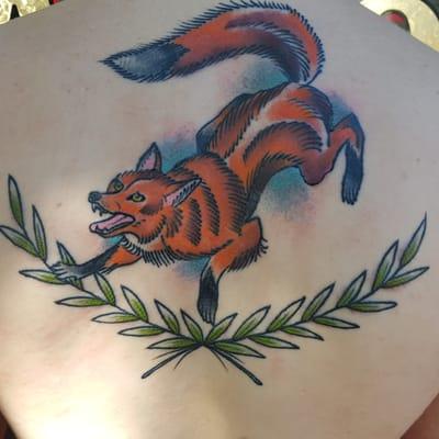 Golden anchor tattoo