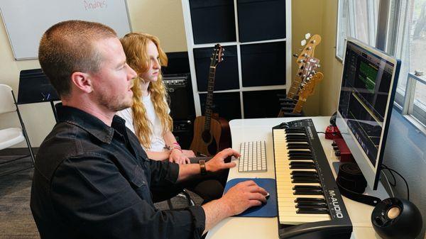 We are offering Music Production lessons! Watch our talented instructor Nik and superstar student Violet create magic in the studio.