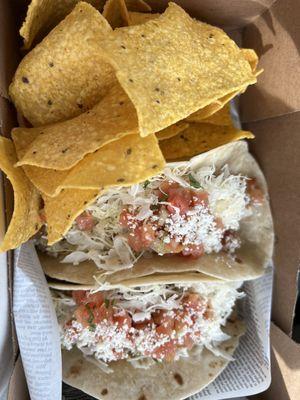 Chicken taco on flour tortilla