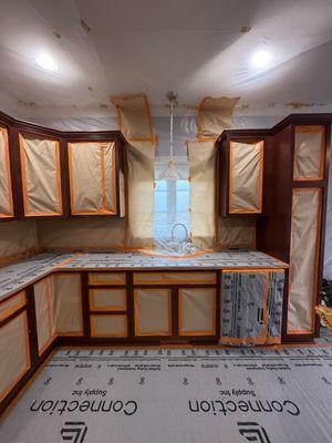 Cabinet refinishing process in progress in Newton, MA.
