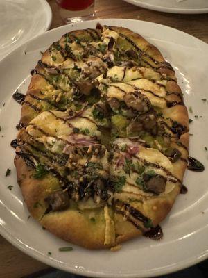December 2023 - Wild mushroom flatbread With basil oil, brie, Parmesan, red onion, and balsamic glaze